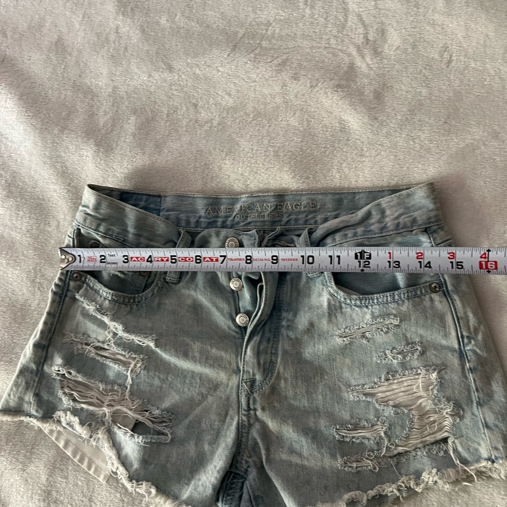 American Eagle Outfitters Light Wash Distressed Denim Cutoff Shorts - Picture 7 of 12